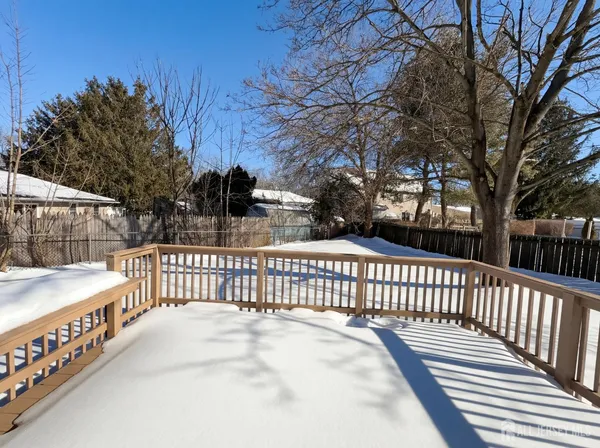 a view of a wooden roof deck