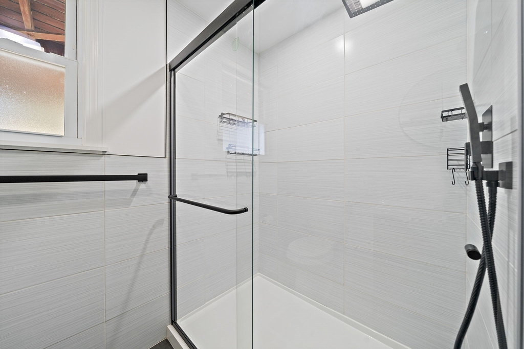 77 Botolph Street Quincy, MA 02171 - Photo 28 of 42 a bathroom with a shower