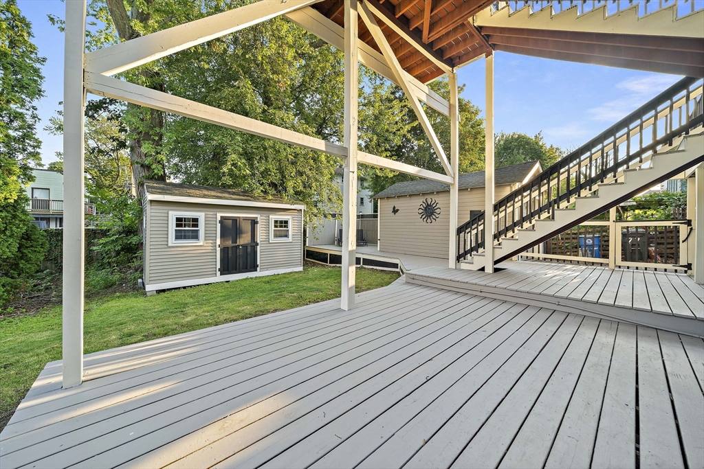 77 Botolph Street Quincy, MA 02171 - Photo 37 of 42 a house view with a deck