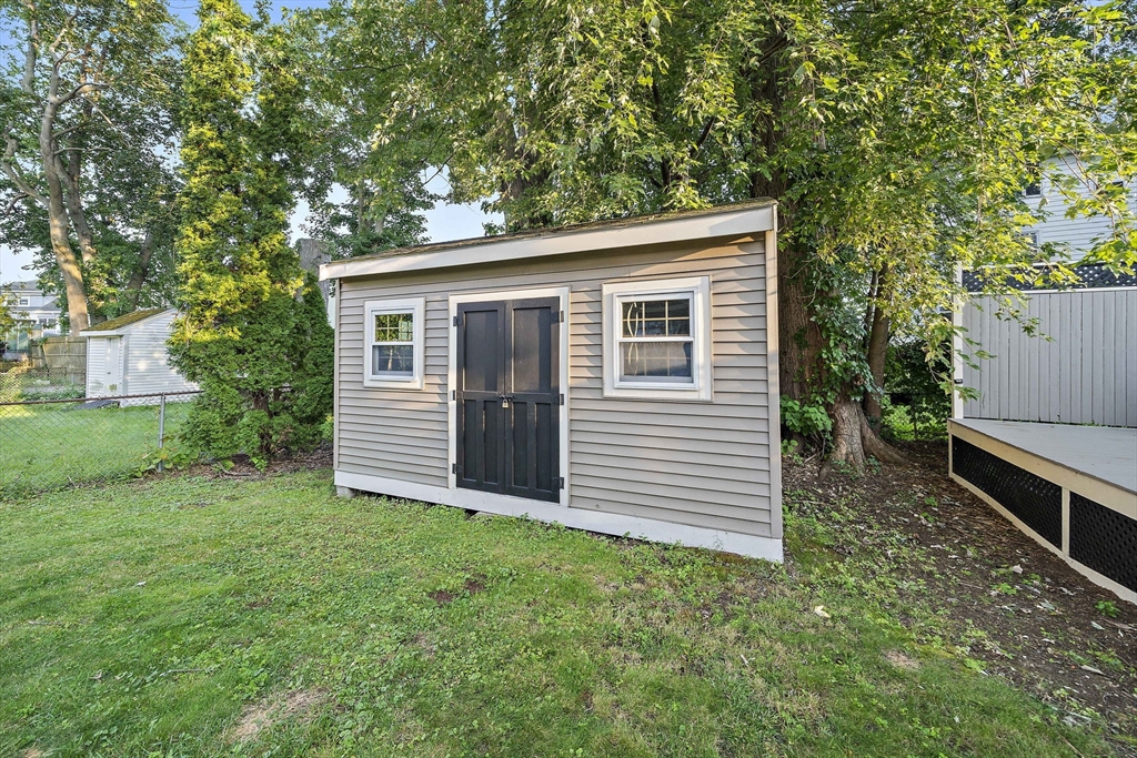 77 Botolph Street Quincy, MA 02171 - Photo 38 of 42 a view of a house and a yard