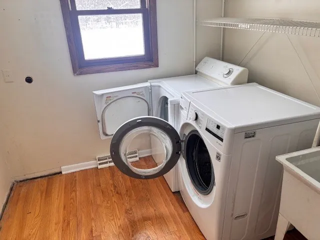 a utility room with dryer and washer