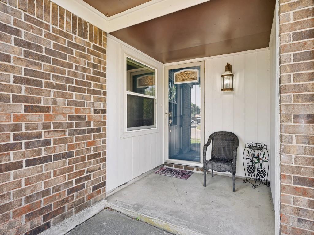6484 Old Mill Circle Watauga, TX 76148 - Photo 2 of 25 Entrance to property with brick siding