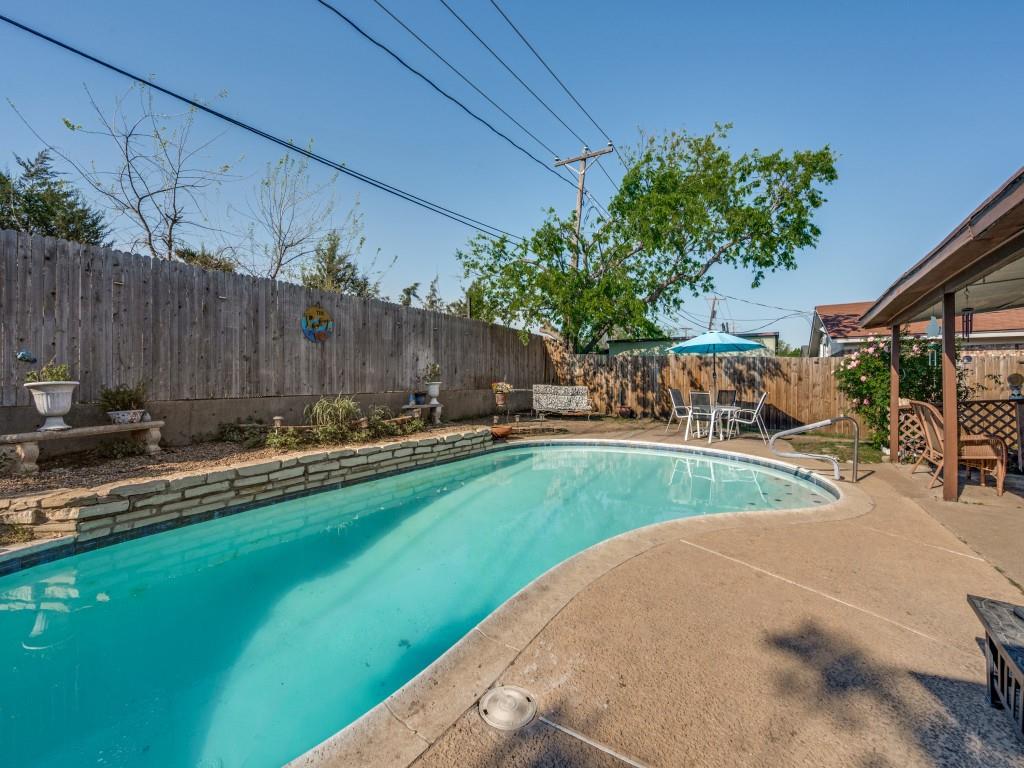 6484 Old Mill Circle Watauga, TX 76148 - Photo 22 of 25 View of swimming pool featuring patio surround, a fenced backyard, and outdoor dining area