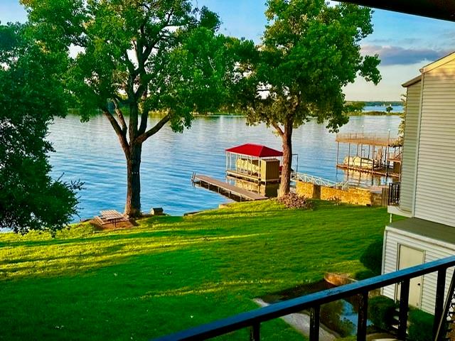 390 Driftwood Court, Unit 3B Azle, TX 76020 - Photo 1 of 40 a view of a park with large trees