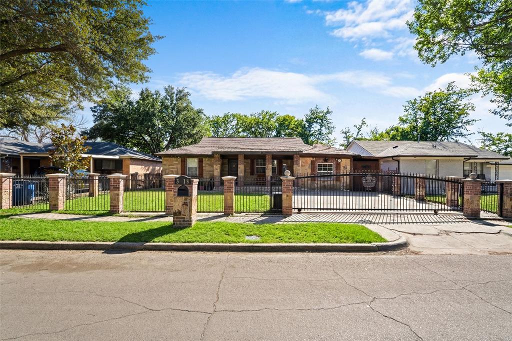 3318 San Marcus Avenue Dallas, TX 75228 - Photo 5 of 18 View of front of property featuring a fenced front yard, driveway, a gate, and an attached garage