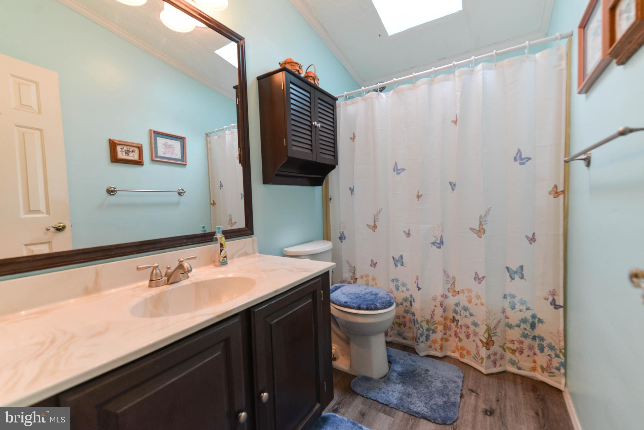 116 Tufts Road Pennsville, NJ 08070 - Photo 13 of 28 Hall bath with full tub/shower combo & tiled floor