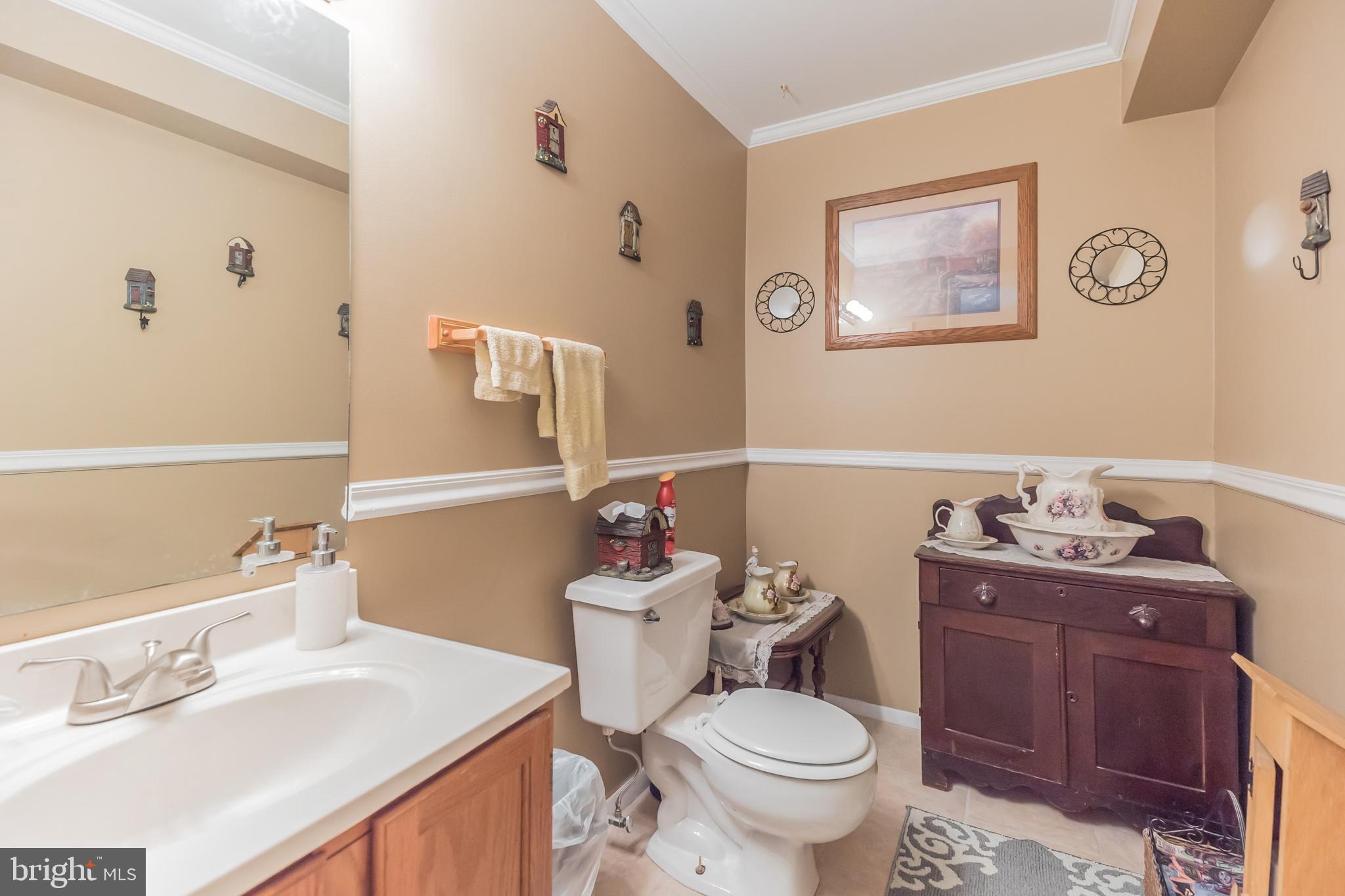 116 Tufts Road Pennsville, NJ 08070 - Photo 24 of 28 Half bath on lower level off Family room