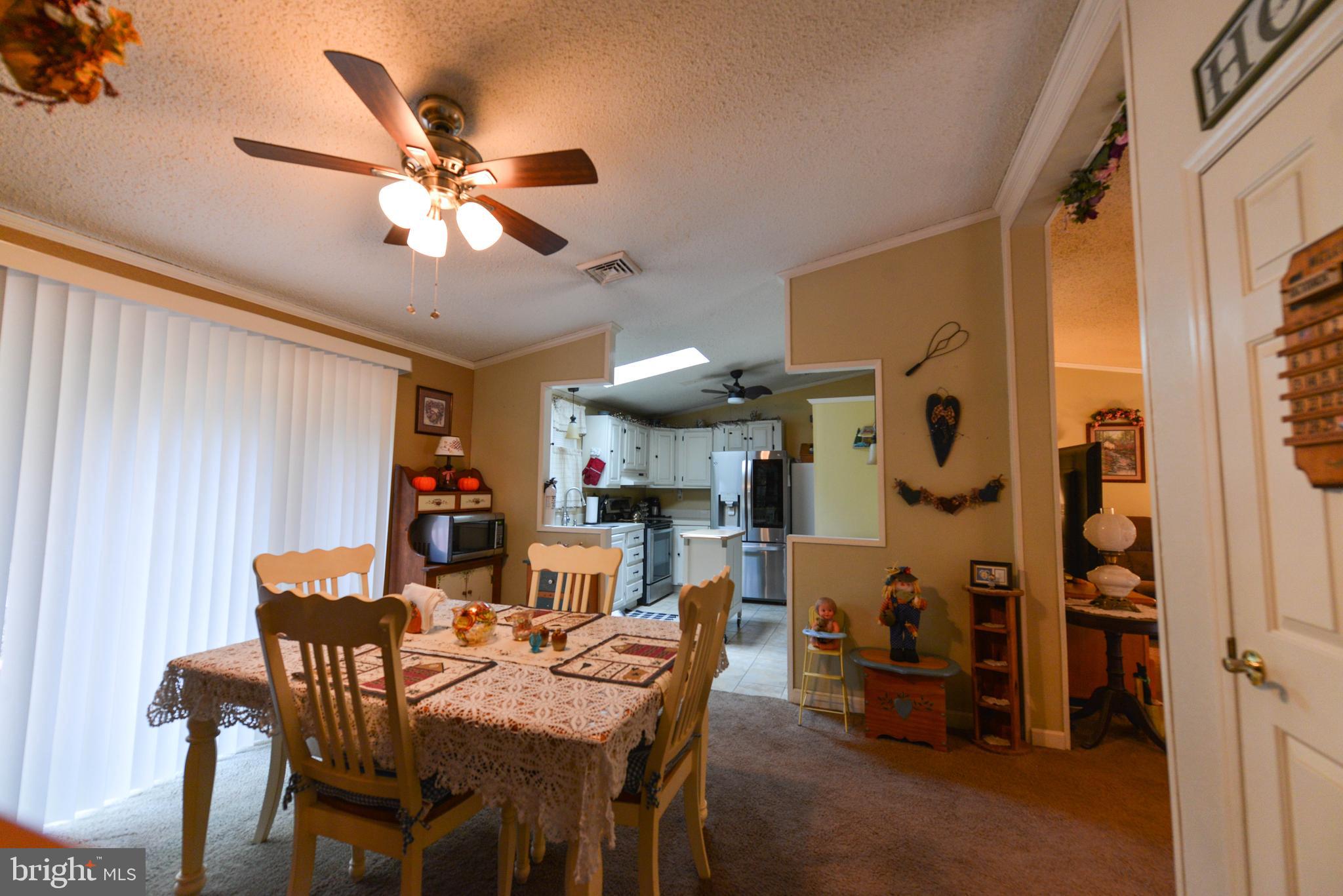 116 Tufts Road Pennsville, NJ 08070 - Photo 10 of 28 Dining Room with sliding door onto private deck