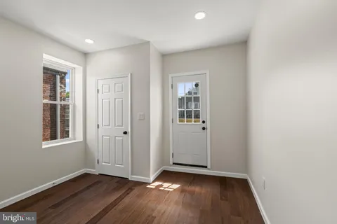 a bathroom with a toilet sink and shower