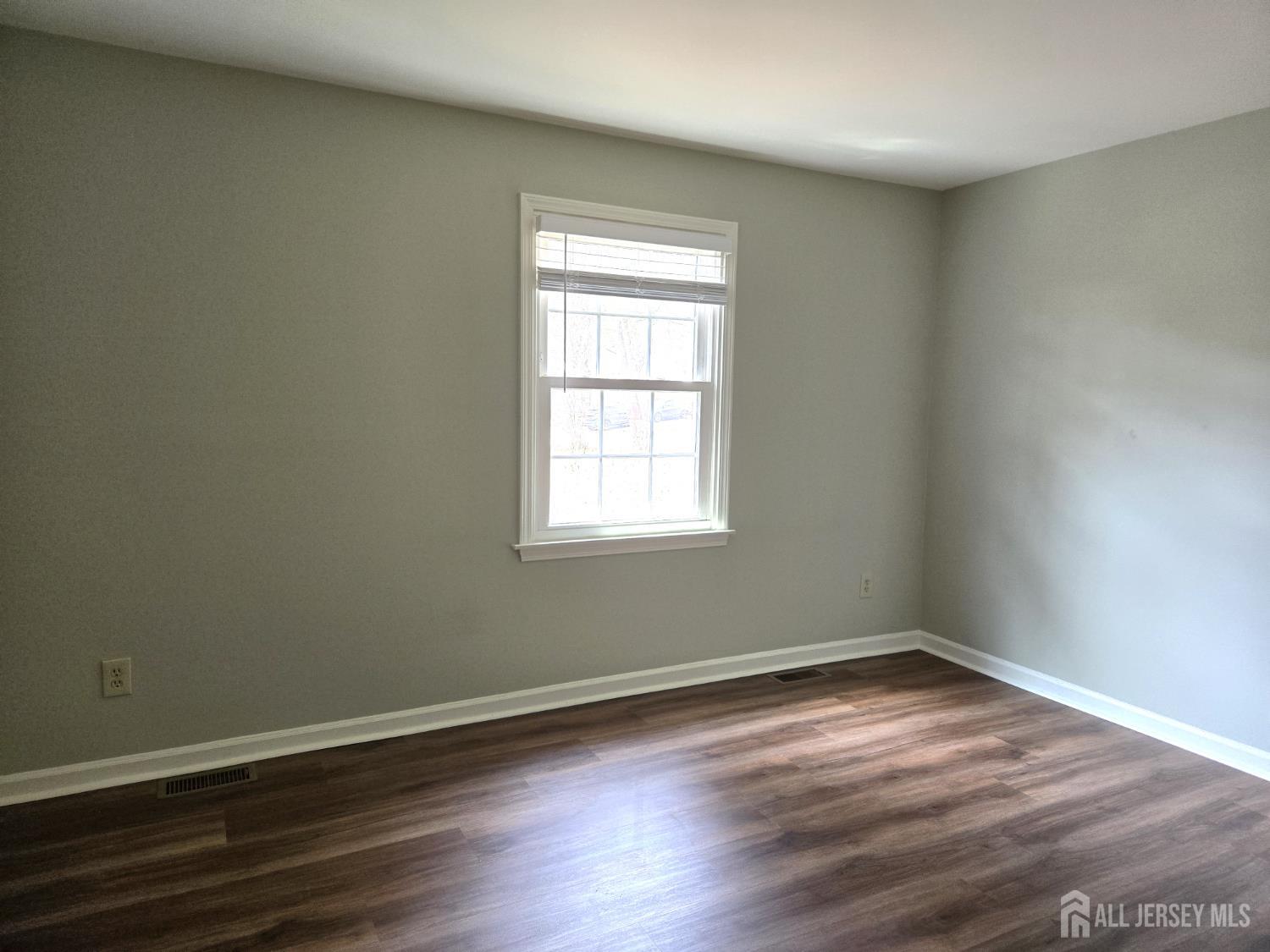 49 Alexandria Way Bernards, NJ 07920 - Photo 11 of 14 wooden floor and window in an empty room