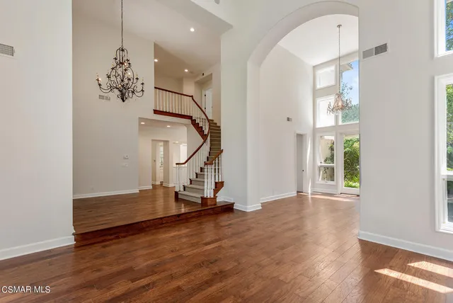 a view of entryway with wooden floor