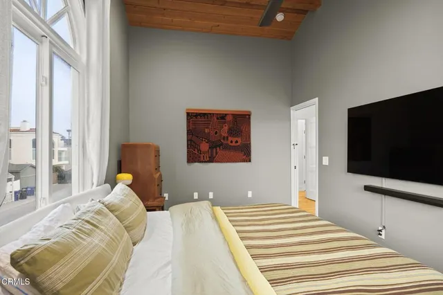 a spacious bathroom with a double vanity sink toilet and shower