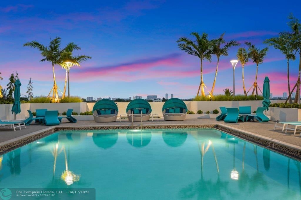 200 Northeast 1st Avenue, Unit 1027 Pompano Beach, FL 33060 - Photo 16 of 18 a view of a balcony with chairs