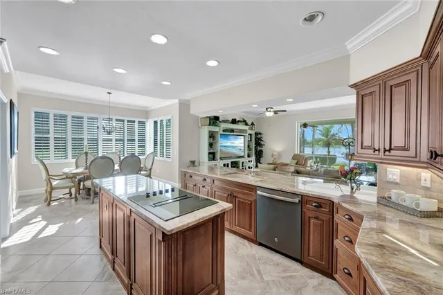a view of living room with granite countertop furniture and a window