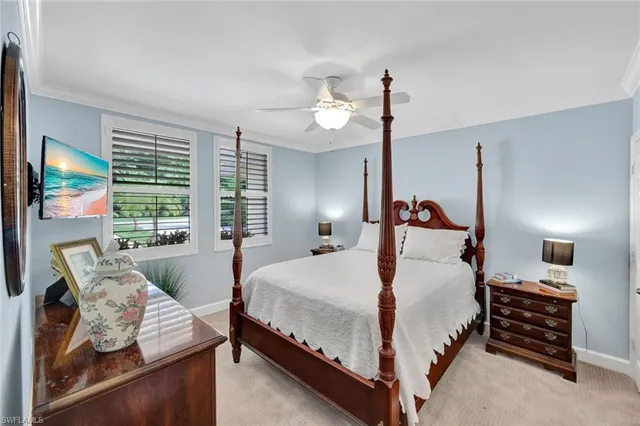 a bathroom with a sink vanity mirror and toilet