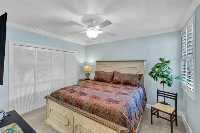 a bathroom with a double vanity sink mirror and toilet