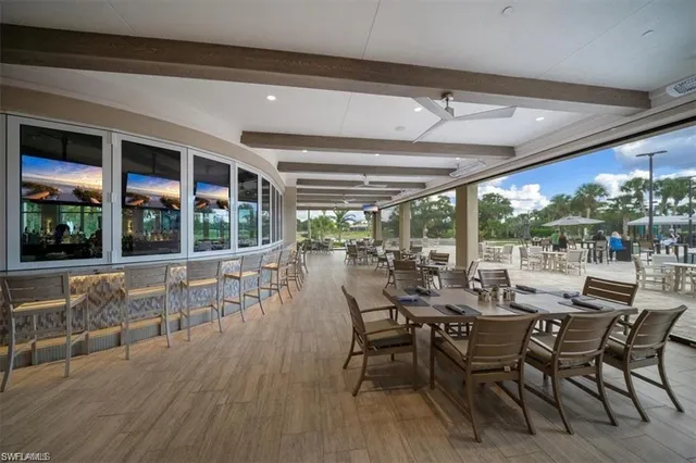 a view of a room with lots of gym equipment