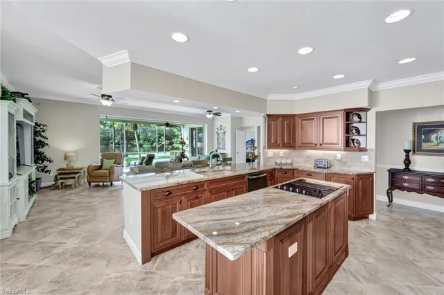 a kitchen with kitchen island granite countertop lots of counter top space