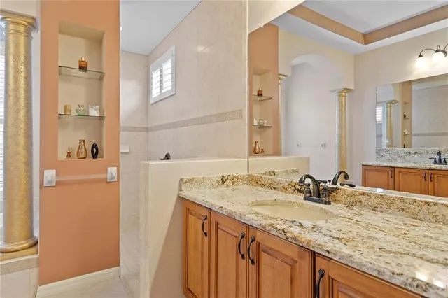 an aerial view of residential houses with outdoor space and street view