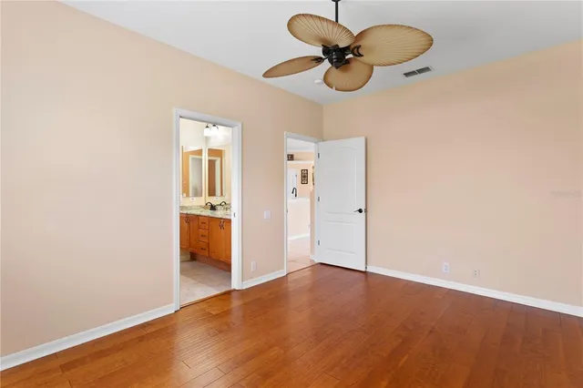a view of a table and chairs in the garden