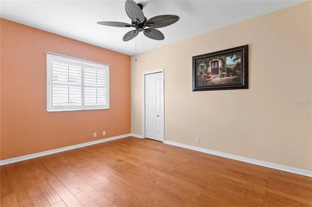 a view of a lake with houses in the back