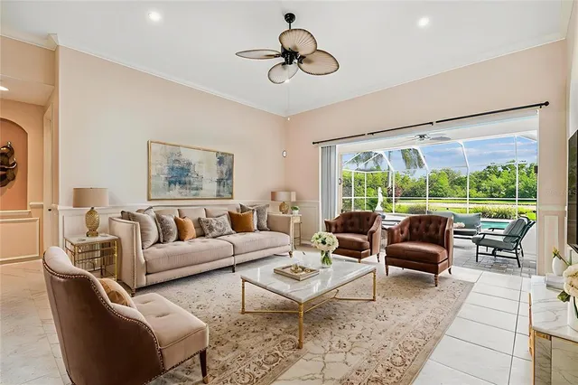 a kitchen with granite countertop cabinets and black appliances