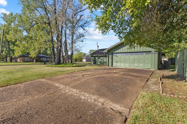 a house with trees in front of it