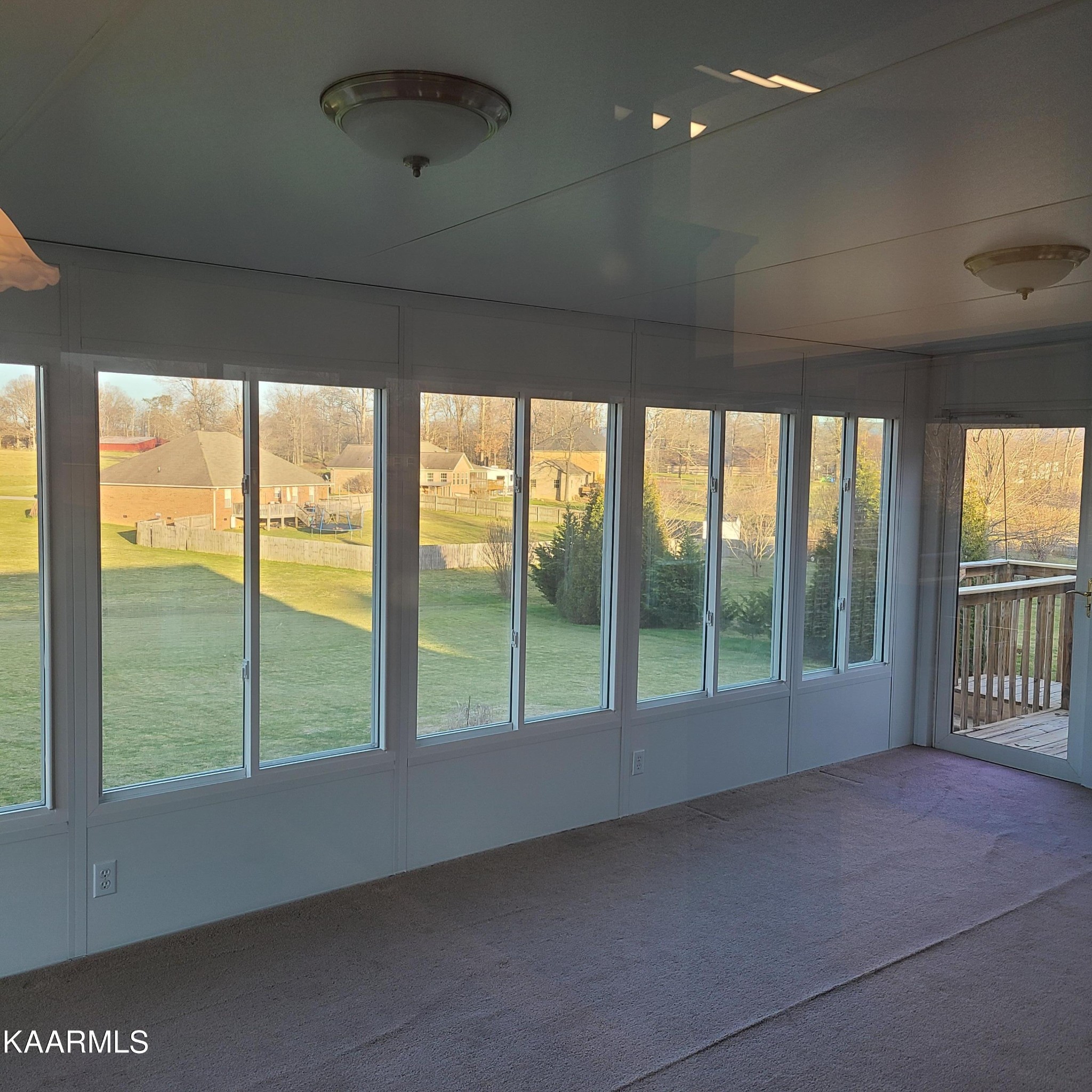5631 J. Riley W Drive Greenback, TN 37742 - Photo 12 of 28 a view of an empty room with windows