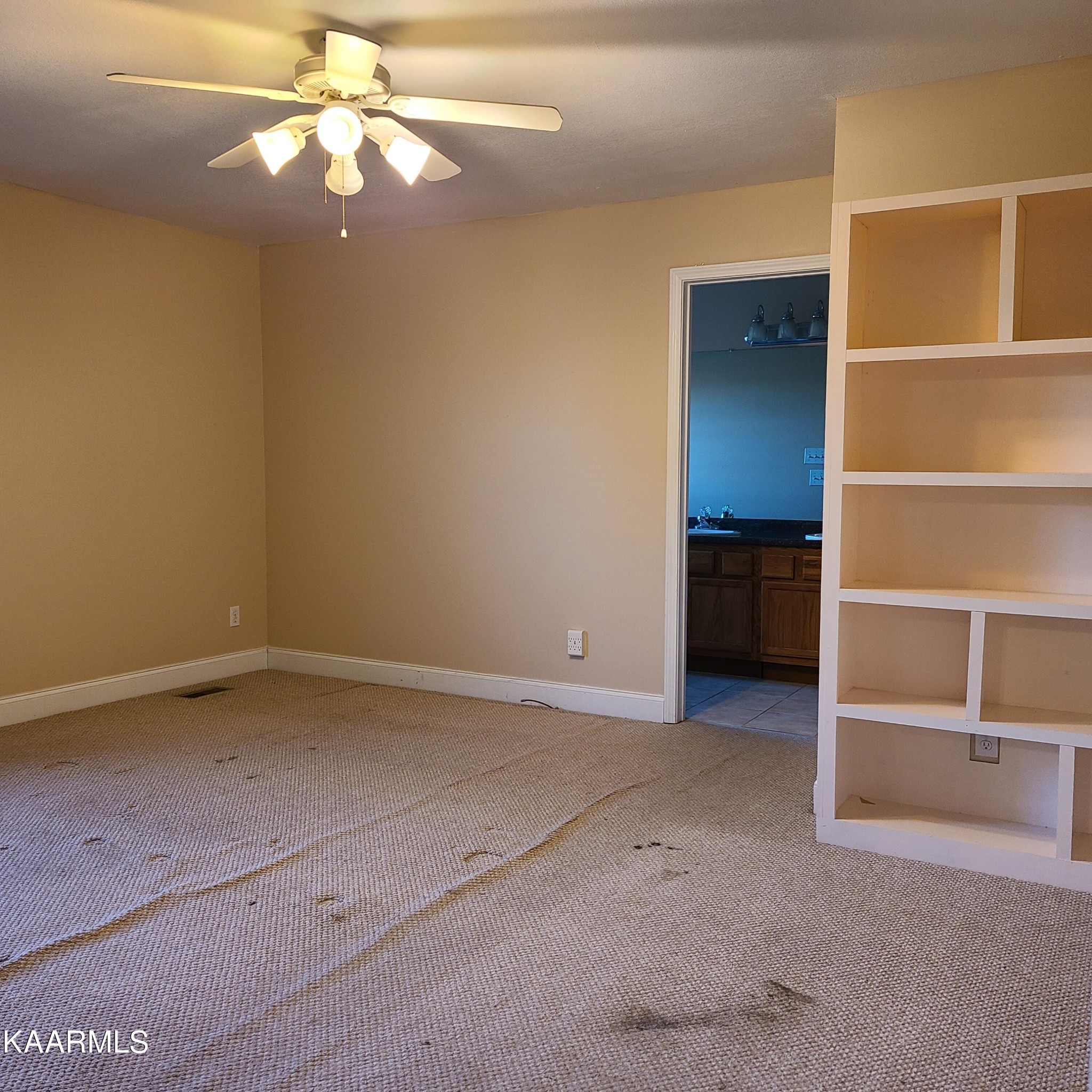 5631 J. Riley W Drive Greenback, TN 37742 - Photo 17 of 28 wooden floor in an empty room with a window