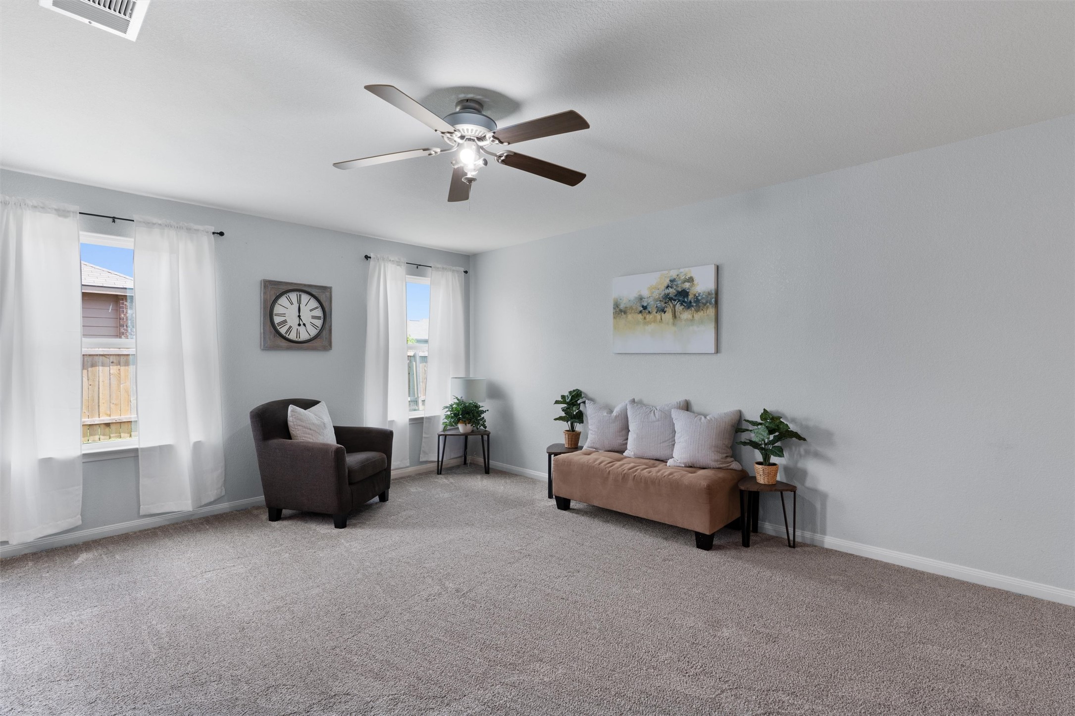 163 Niven Path, Unit 12K Jarrell, TX 76537 - Photo 8 of 31 a living room with furniture and windows
