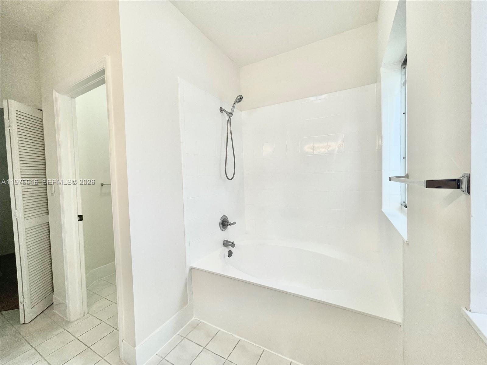 10160 Southwest 88th Street, Unit 201 Miami, FL 33176 - Photo 25 of 43 a bathroom with a shower