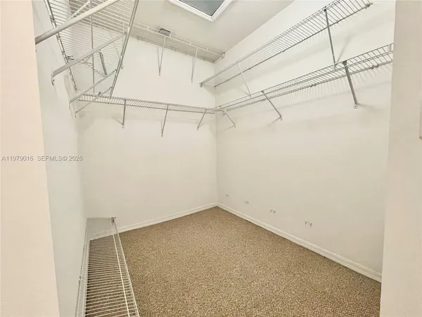 a view of a room with racks on the wall