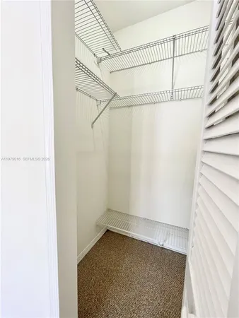 a view of a room with racks on the wall