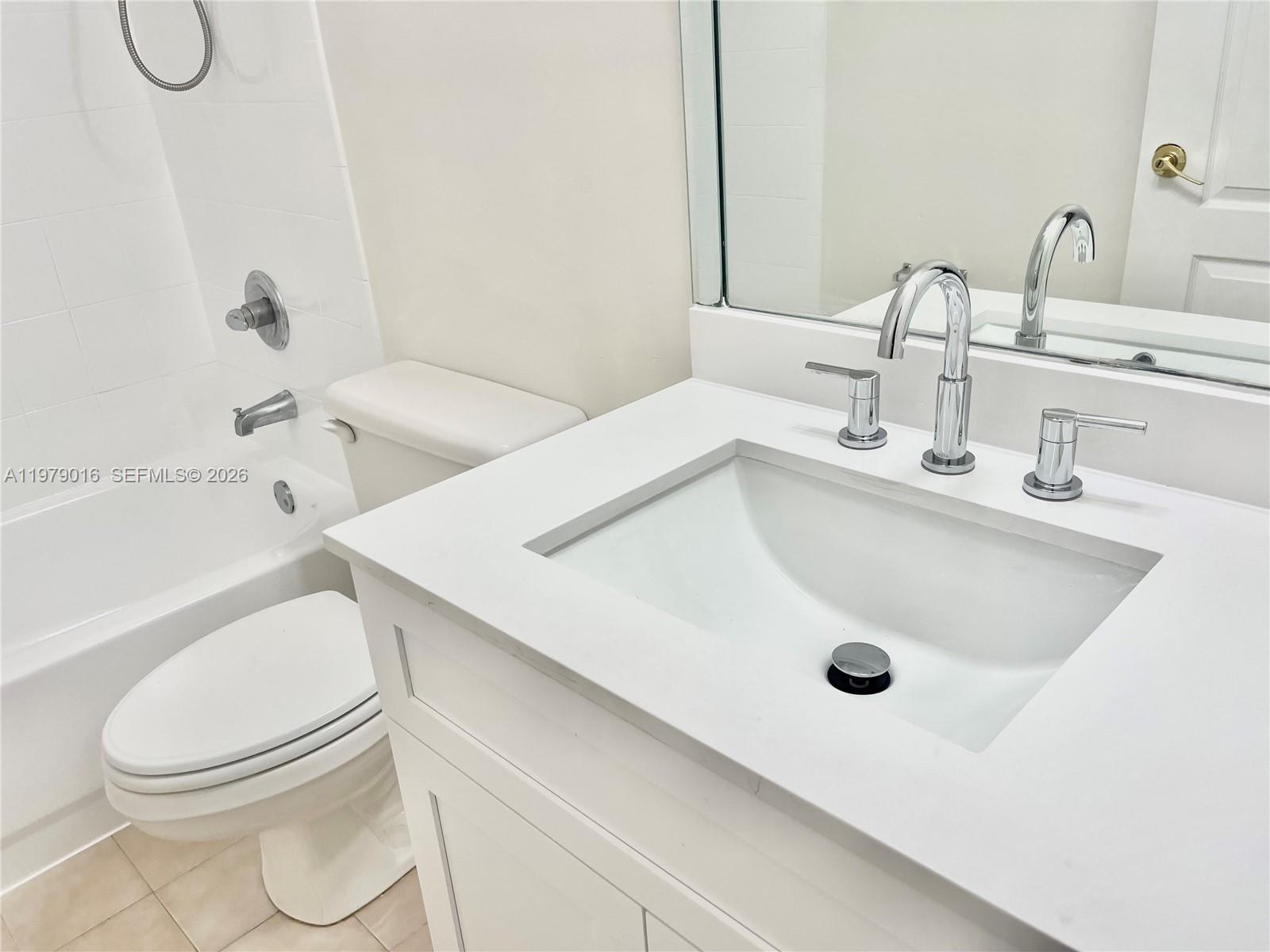 10160 Southwest 88th Street, Unit 201 Miami, FL 33176 - Photo 37 of 43 a bathroom with a sink and a toilet
