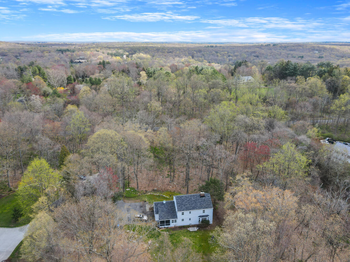 190 Briscoe Road New Canaan, CT 06840 - Photo 21 of 21 an aerial view of a house with a yard