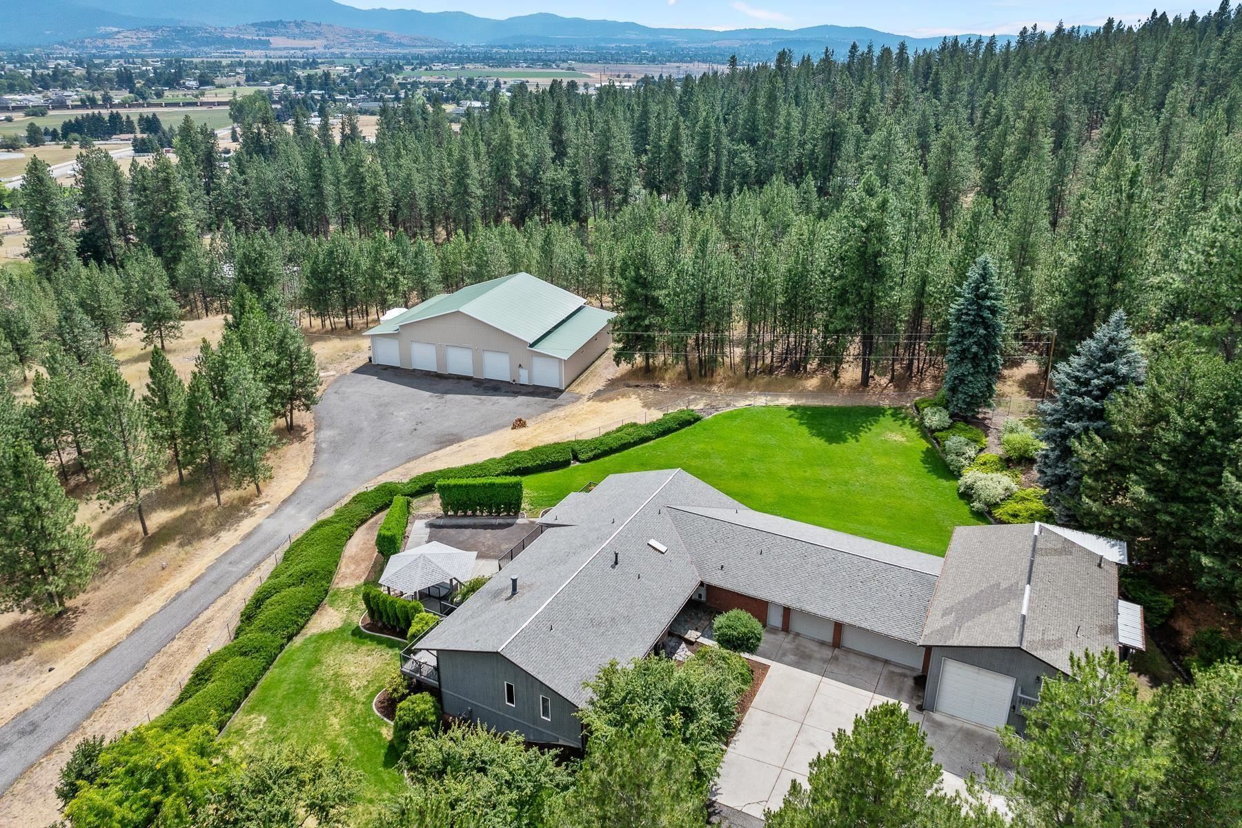 6127 North Campbell Road Otis Orchards, WA 99027 - Photo 1 of 50