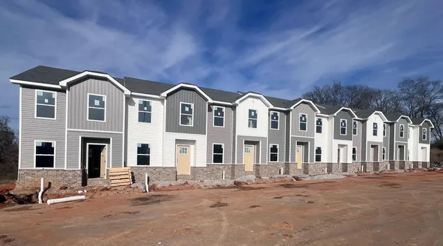 a front view of multiple houses