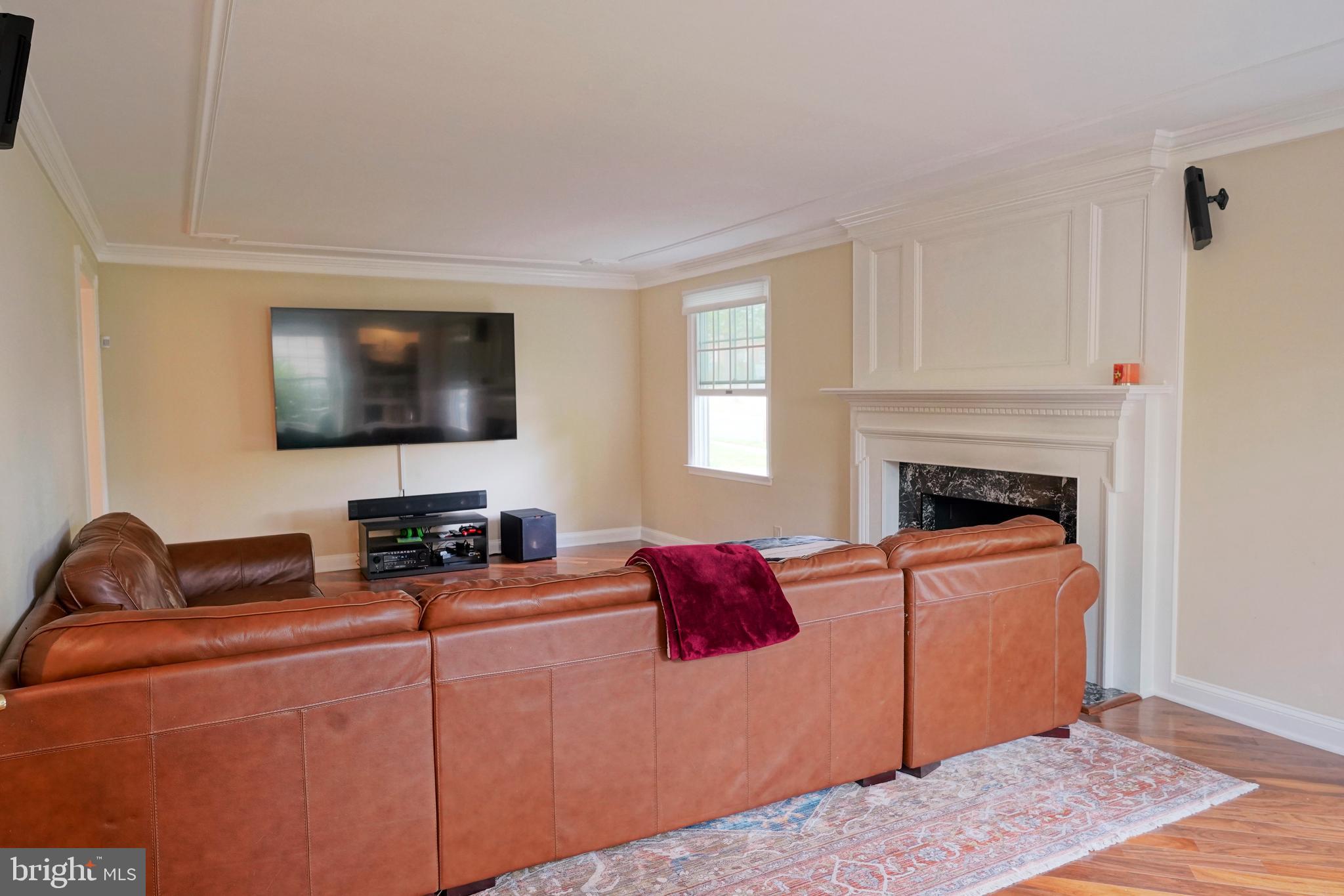 40 Covered Bridge Road Cherry Hill, NJ 08034 - Photo 22 of 52 a living room with furniture and a flat screen tv