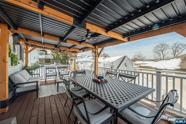 a view of patio with table and chairs