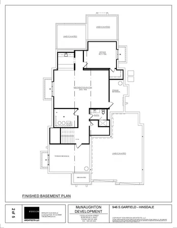 a view of a hallway with wooden floor and stairs