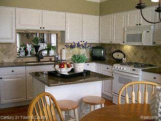 1602 Boulder Court, Unit 78 Rochester, MI 48306 - Photo 3 of 14 island kitchen