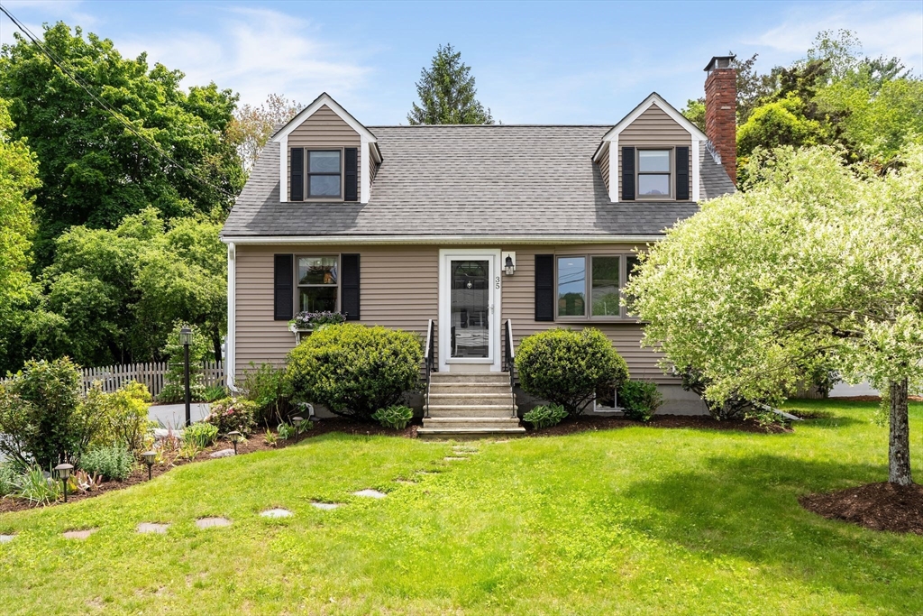 35 Spallus Road Stoughton, MA 02072 - Photo 2 of 39 a front view of a house with a yard
