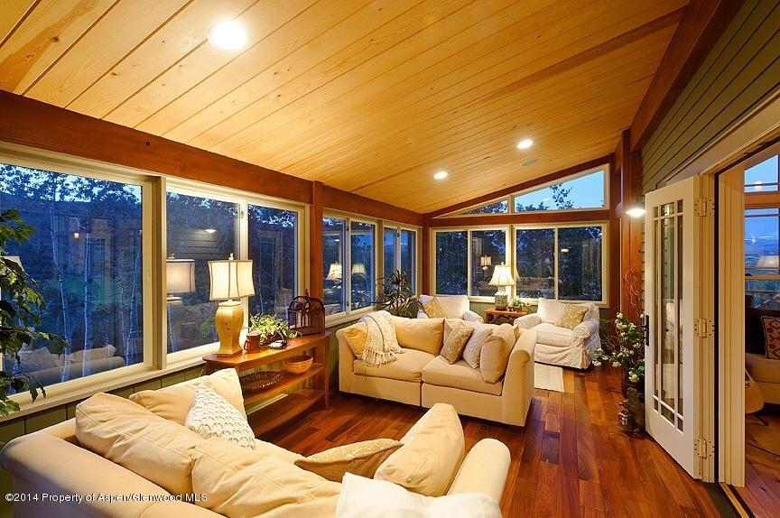 501 Greenfield Road Basalt, CO 81621 - Photo 13 of 36 a living room with furniture and a large window