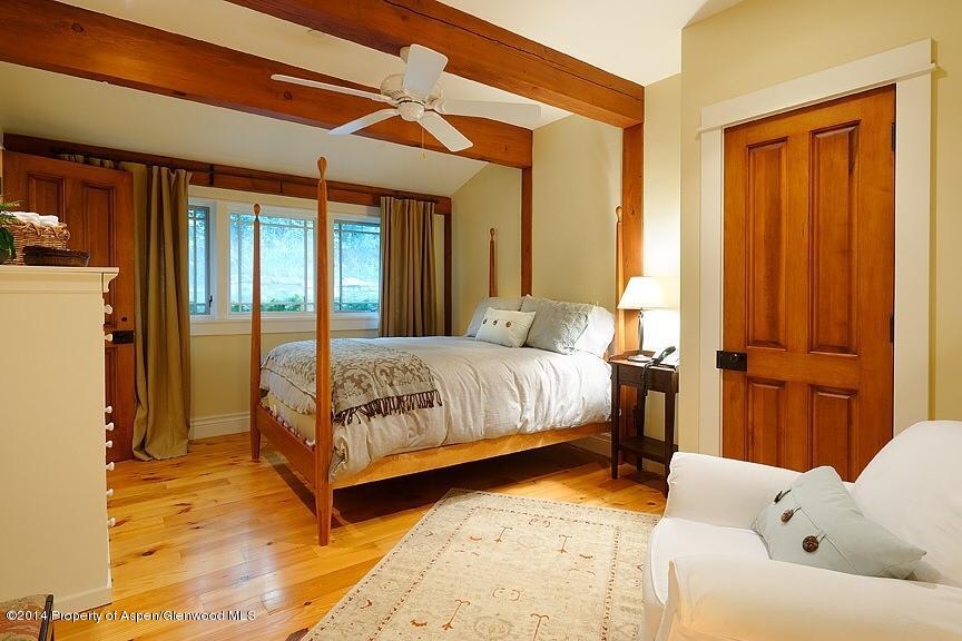 501 Greenfield Road Basalt, CO 81621 - Photo 15 of 36 a bedroom with a bed and a window
