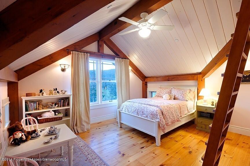 501 Greenfield Road Basalt, CO 81621 - Photo 20 of 36 a bedroom with a bed and a large window with the ocean view
