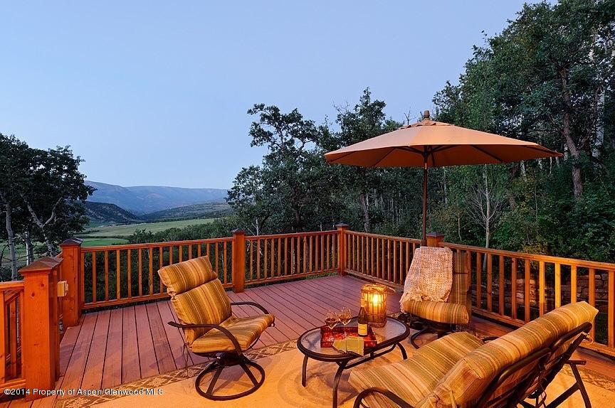 501 Greenfield Road Basalt, CO 81621 - Photo 26 of 36 a view of balcony with wooden floor and outdoor seating