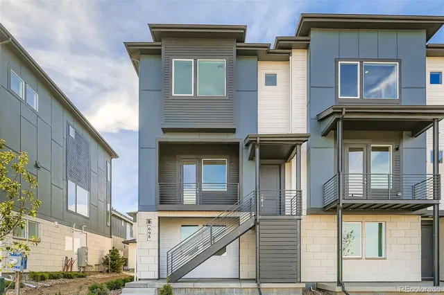 a front view of a house with a garage