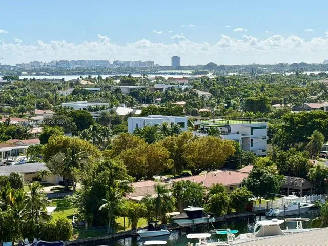 an aerial view of a city with lots of residential buildings