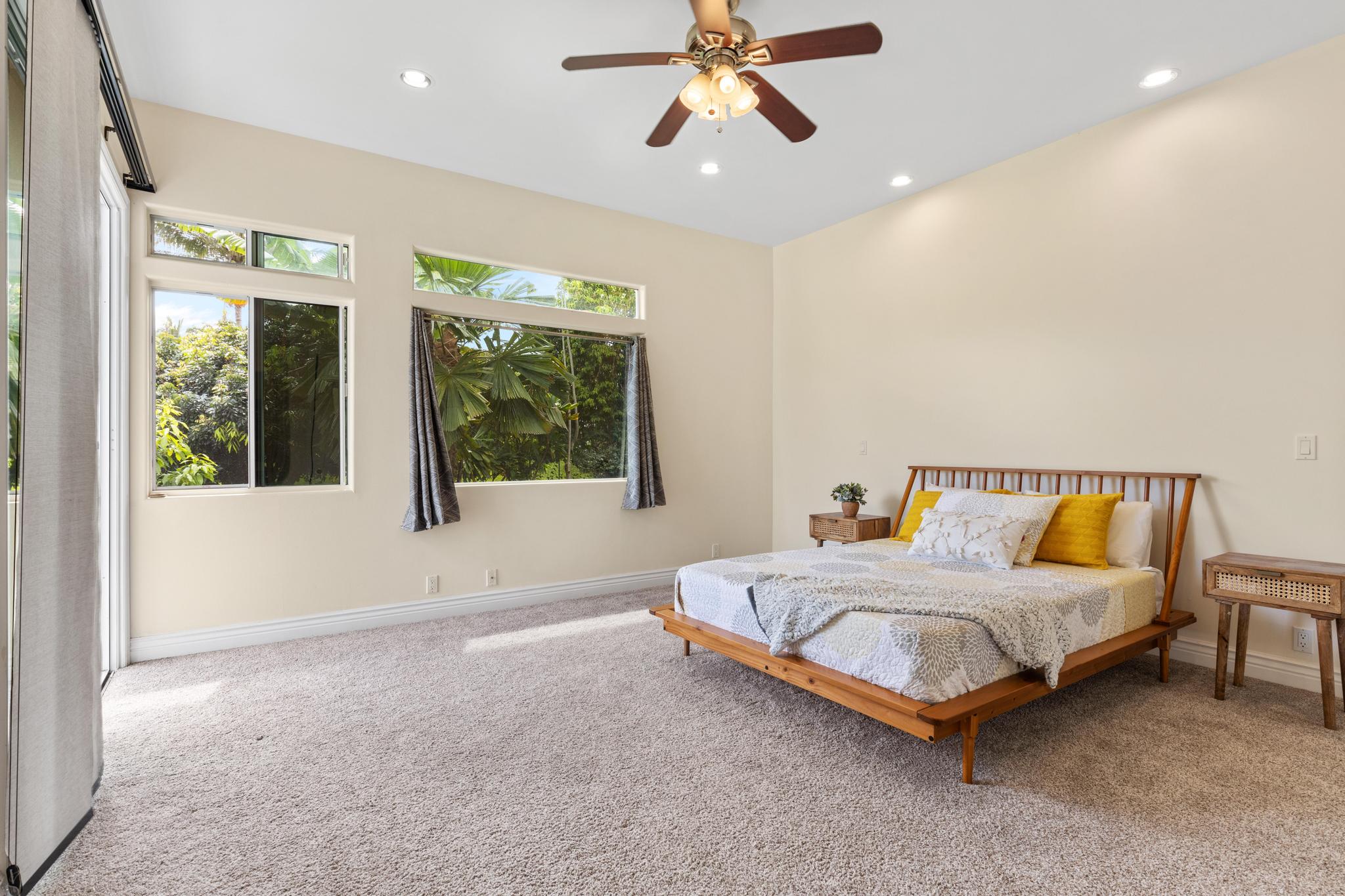 28-256 Akaka Falls Road Honomu, HI 96728 - Photo 12 of 30 a spacious bedroom with a bed and a window