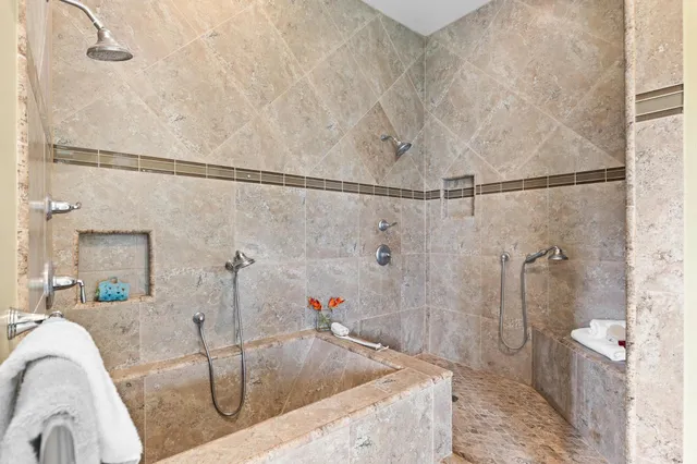 a bath tub sitting next to a bathroom